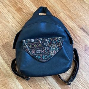 Backpack with colorful stitching